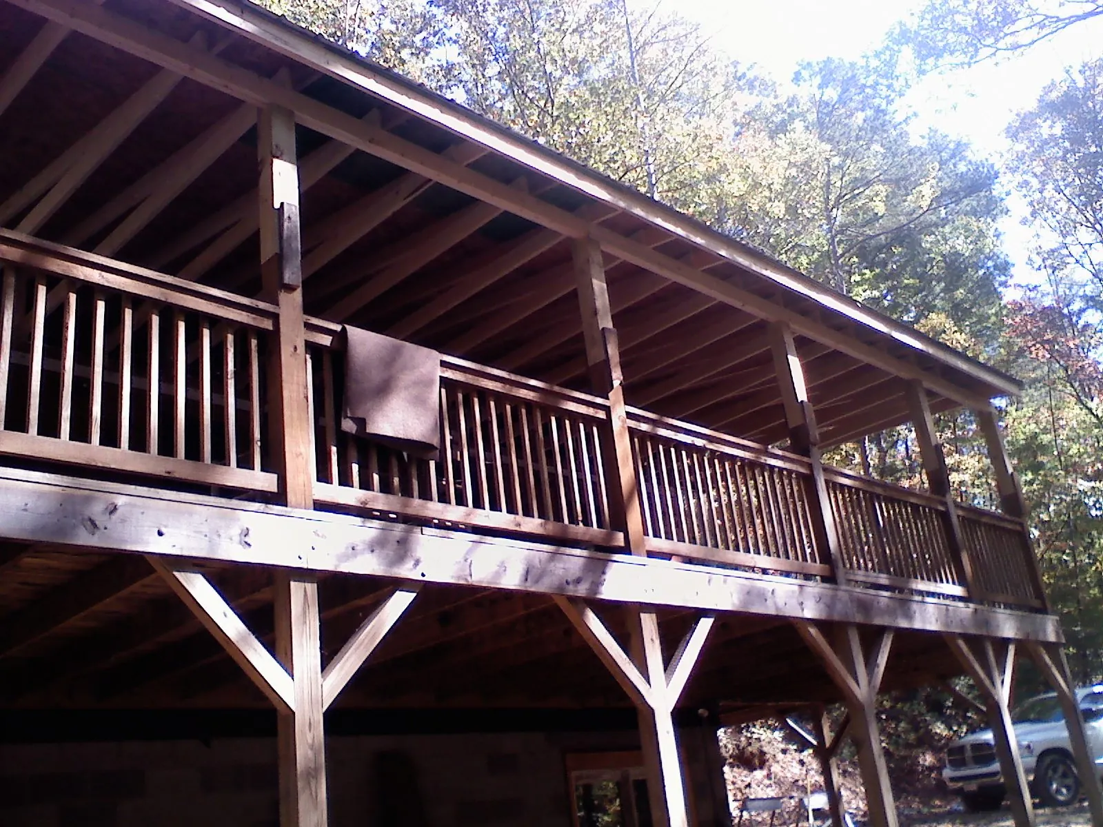 Timber framing under a new elevated porch and deck — Roof Leak Repair in Government Camp by Roofing Brothers